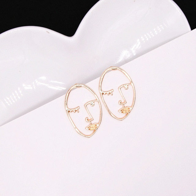 Abstract Hollow Out Face/Hand Dangle Earrings